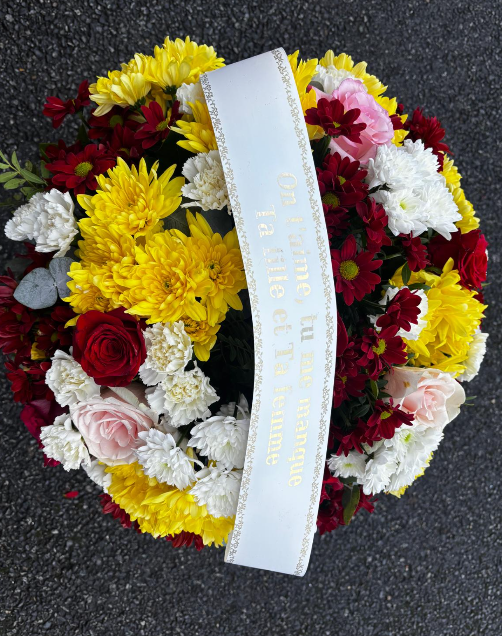 Couronne d'hommage fleurie multicolore